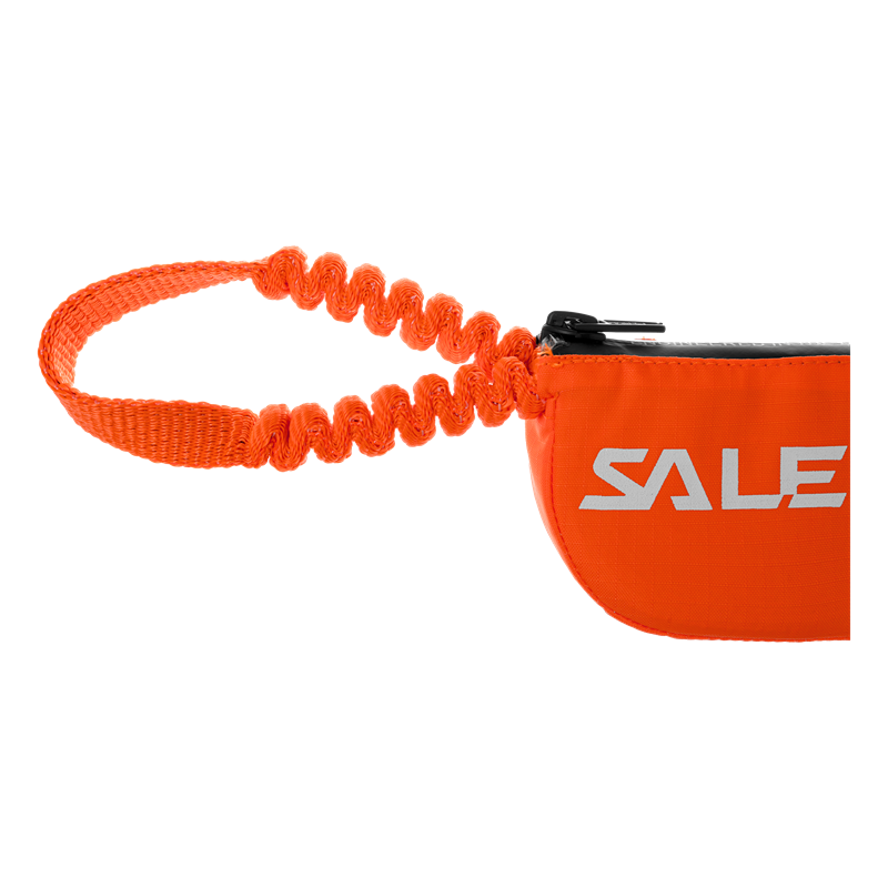 Orange bag with a coiled strap that holds energy absorbing webbing for a via ferrata lanyard 