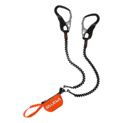 Black and orange climbing equipment with a coiled rope on a white background